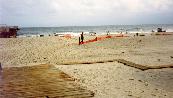 A view of the beach on a cool day.