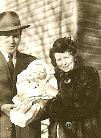 My mother and father with their firstborn, my sister, Mary.