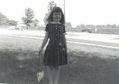 I am standing in our front yard. You can see the cemetery hedges and a road in front of it.