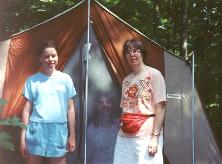 One of my daughters and myself in front of our tent at the Farm.