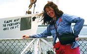 Me, standing by one of the life boats on the ferry.