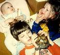 All 3 kids with the turtles.