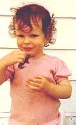 Anna holding a toad, about 1983 or so.