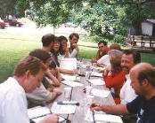 Busy at work planning our events, another picture at the picnic table/Singles business meeting.